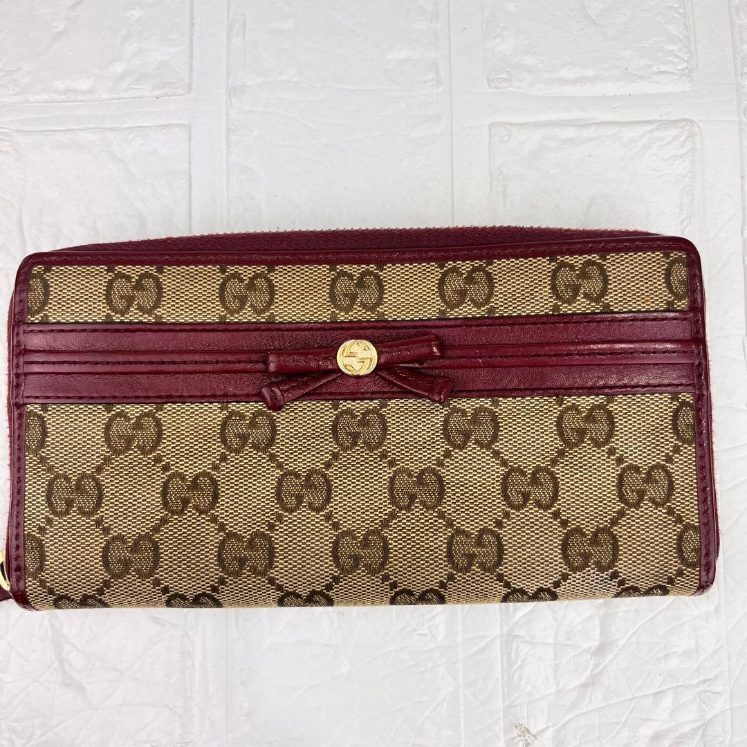 良品　GUCCI GGキャンバス　ラウンドファスナー　ボルドー　リボン　ロゴ金具