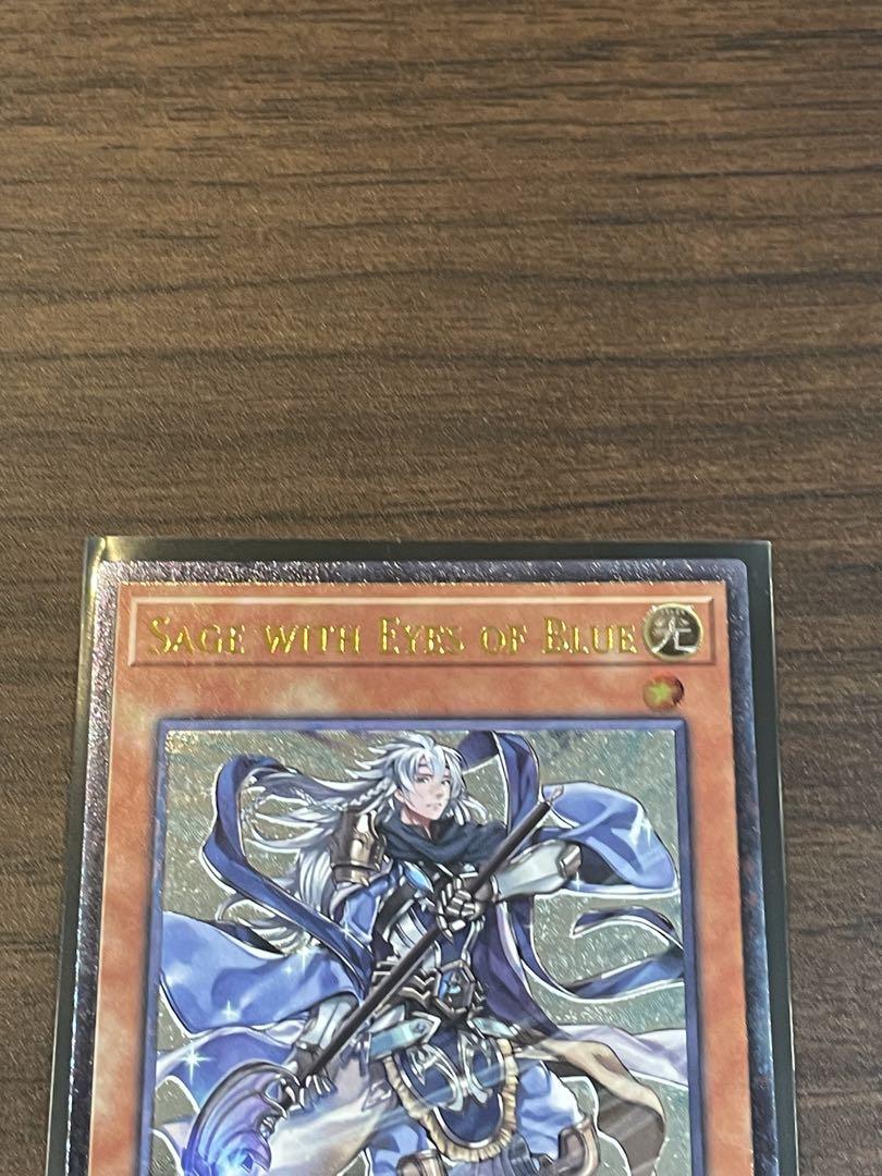 同梱200円引き】遊戯王 青き眼の賢士 レリーフ - メルカリ