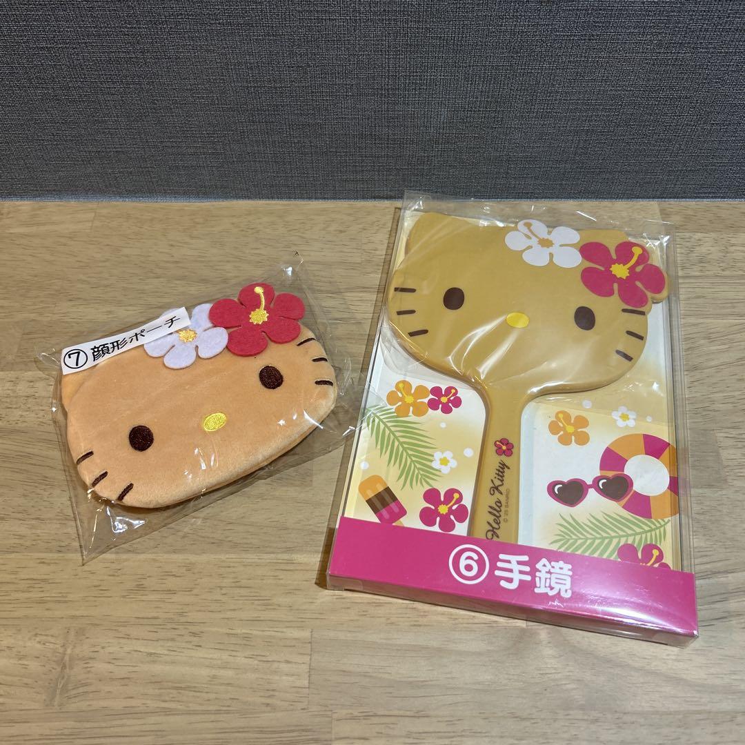日焼けキティ 当たりくじ 一番くじ 手鏡 顔型ポーチ - メルカリ