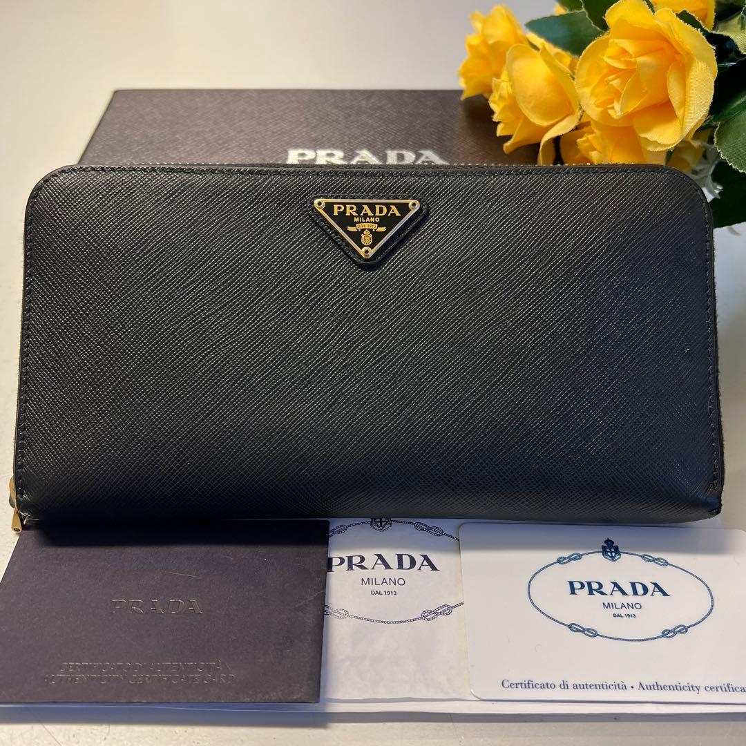 長財布 未使用に近い‼️ プラダ 財布 長財布 サフィアーノ ロゴ金具