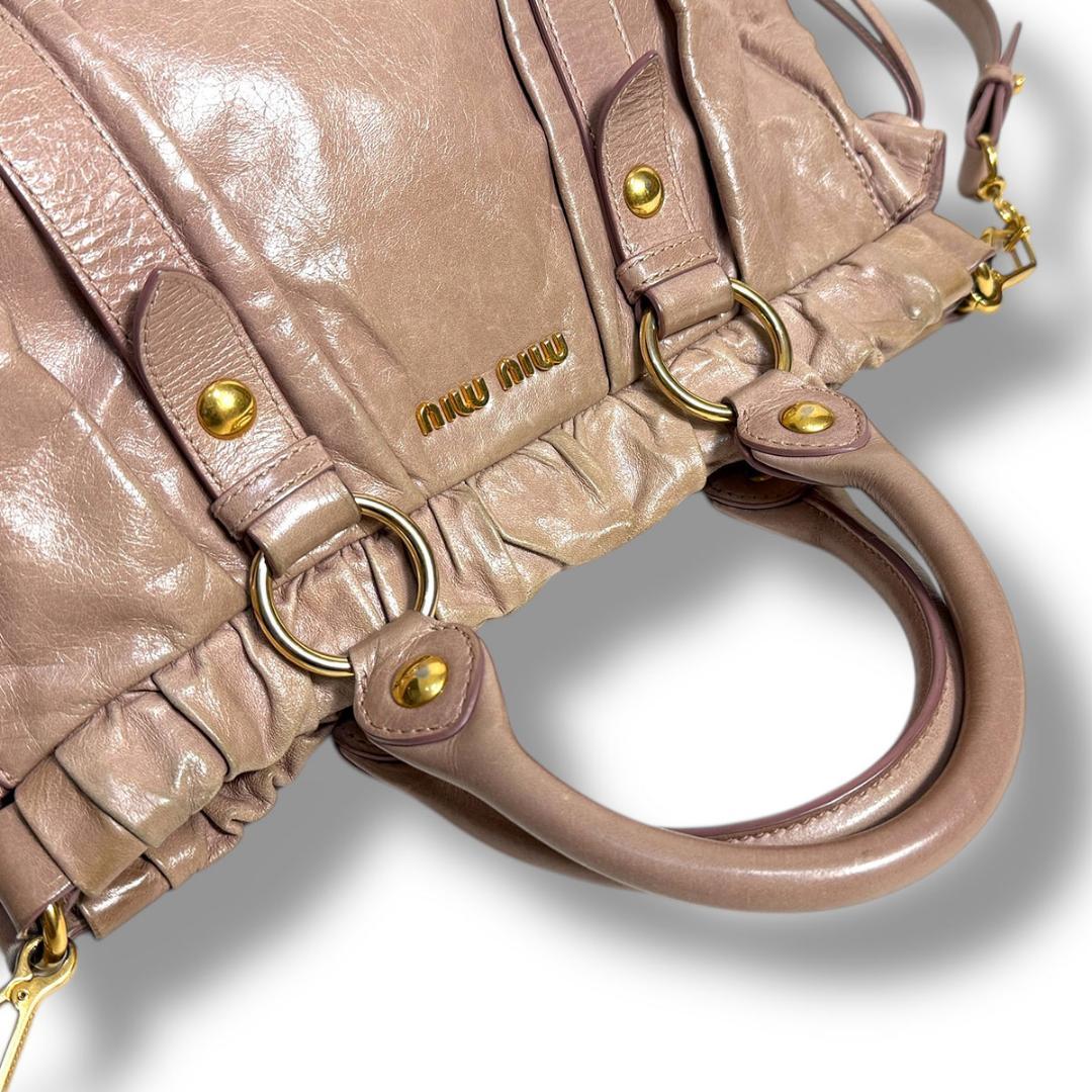 バッグ miumiu Y2K VITELLOLUX pink beige ARCHIVE miumiu Y2K VITELLOLUX pink beige ARCHIVE - メルカリ