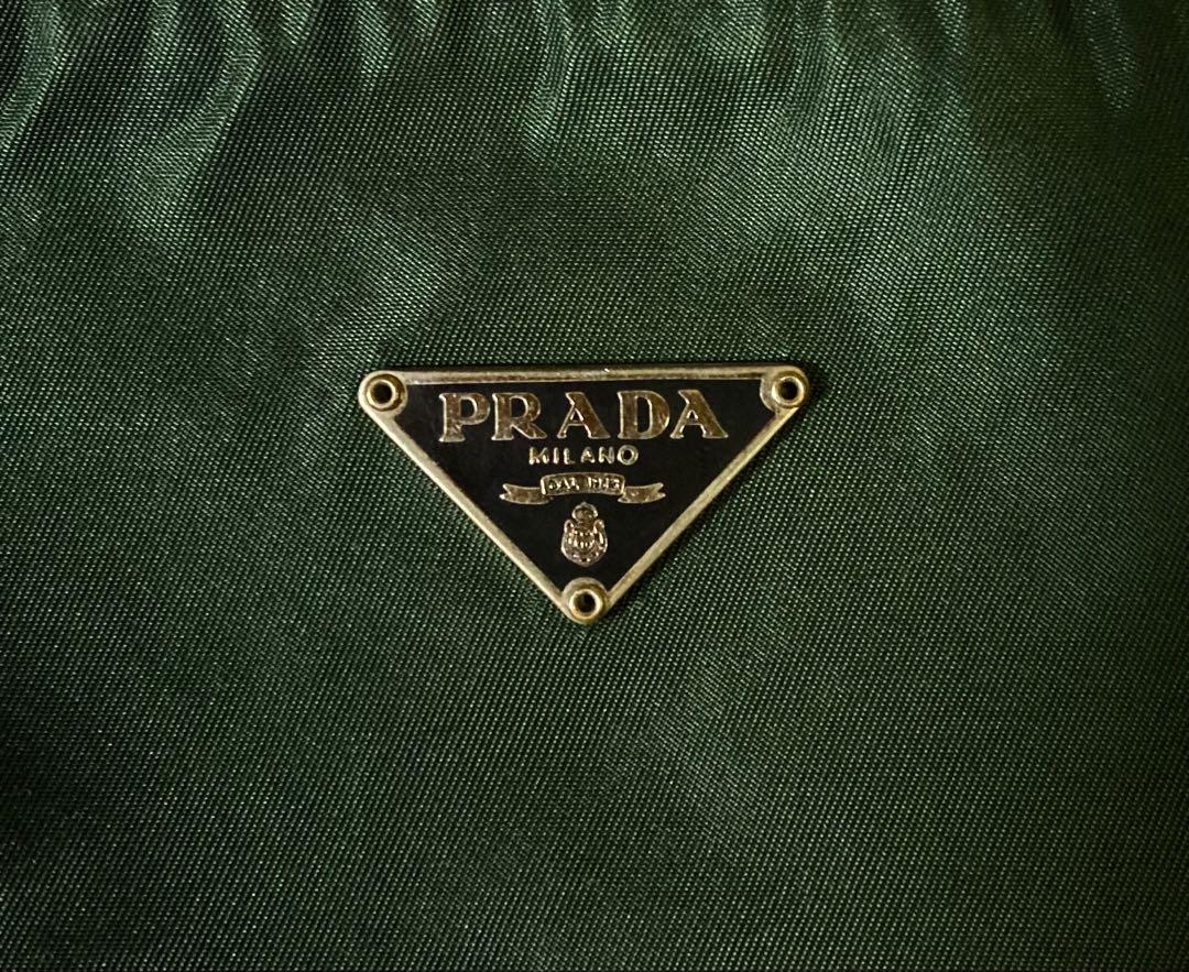 プラダ PRADA ポーチ 三角ロゴ ナイロン - メルカリ
