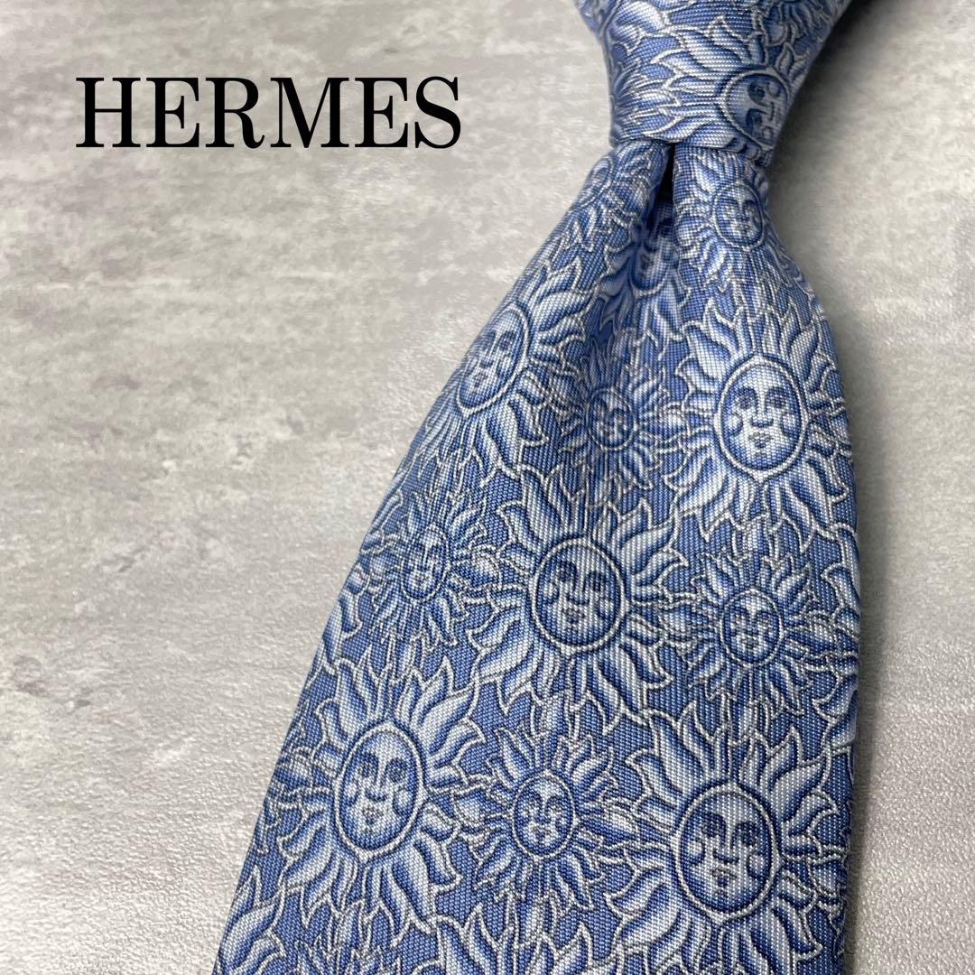 美品 HERMES エルメス 太陽 SUN 総柄 ネクタイ 水色 ブルー
