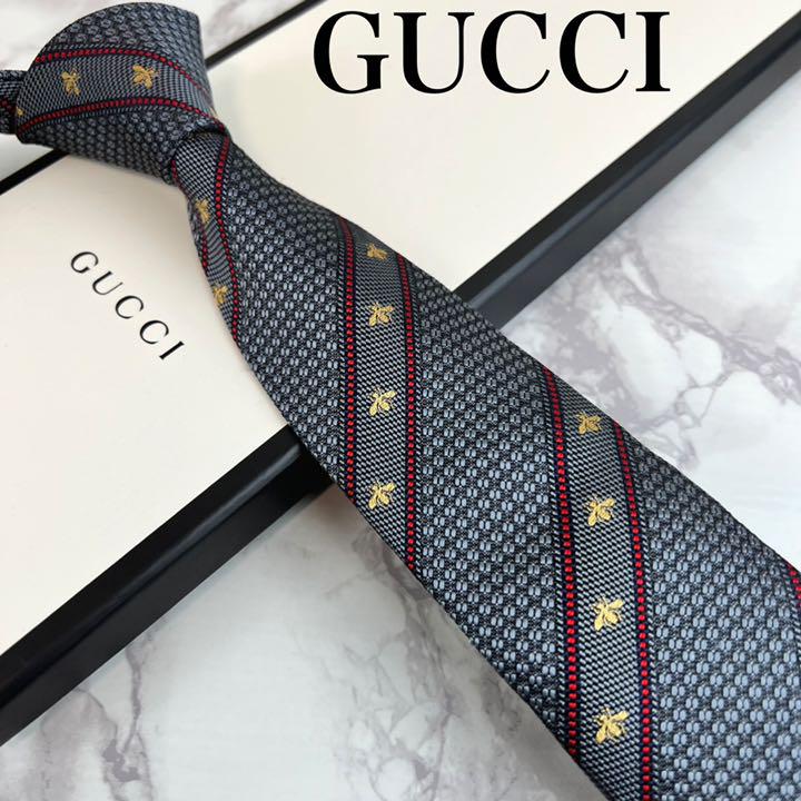 満点の 箱 タグ付 美品 GUCCI グッチ ネクタイGロゴ キューブ ネイビー