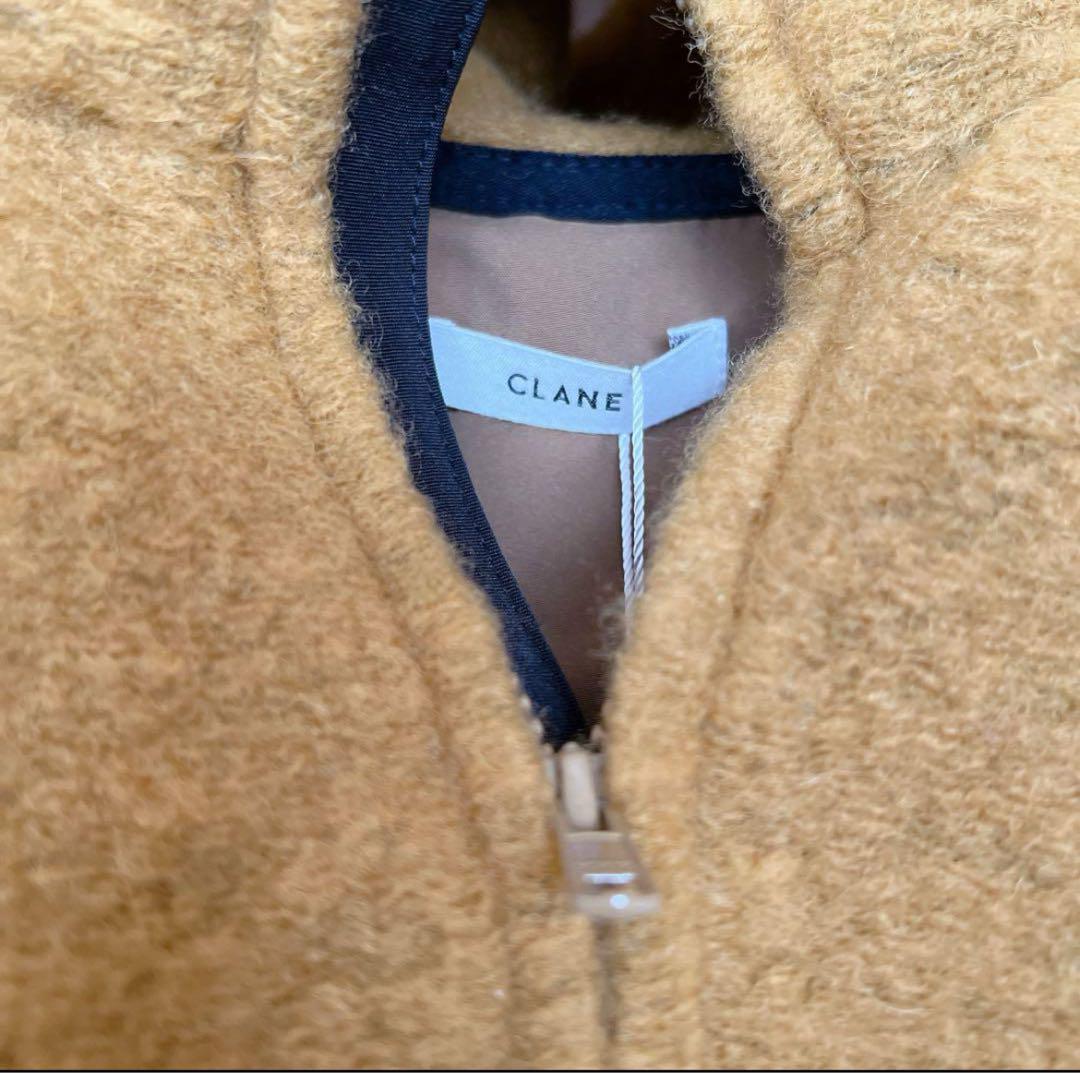 CLANE（クラネ）の「CLANE/クラネ/SLIVER HALF ZIP TOPS（T