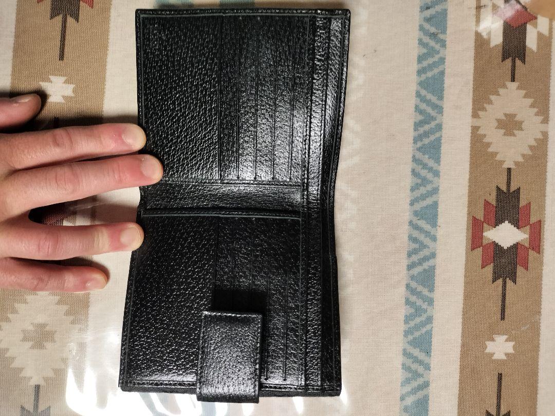 GUCCI グッチ　二つ折り財布　シマ　総柄　型押しロゴ　キャンバス　レザー