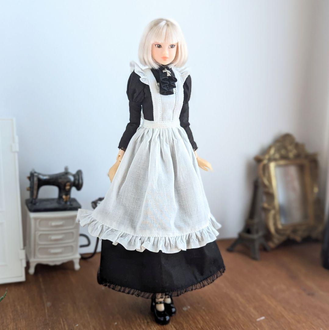 ハンドメイド　ドールワンピース　ワンピース　100cm(5T) ワンピースとヘアゴムセット 北欧調四角柄ピンク 26cm サイズの