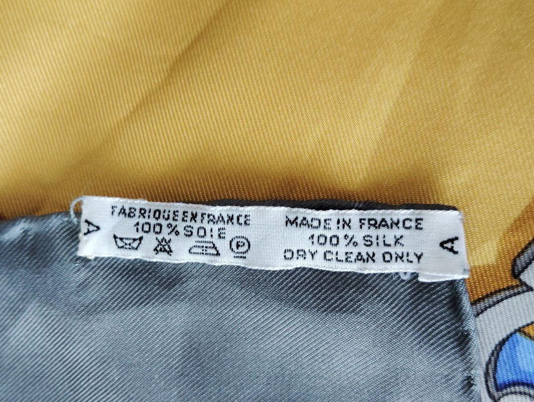 HERMES シルクスカーフ 装飾的な金具デザイン