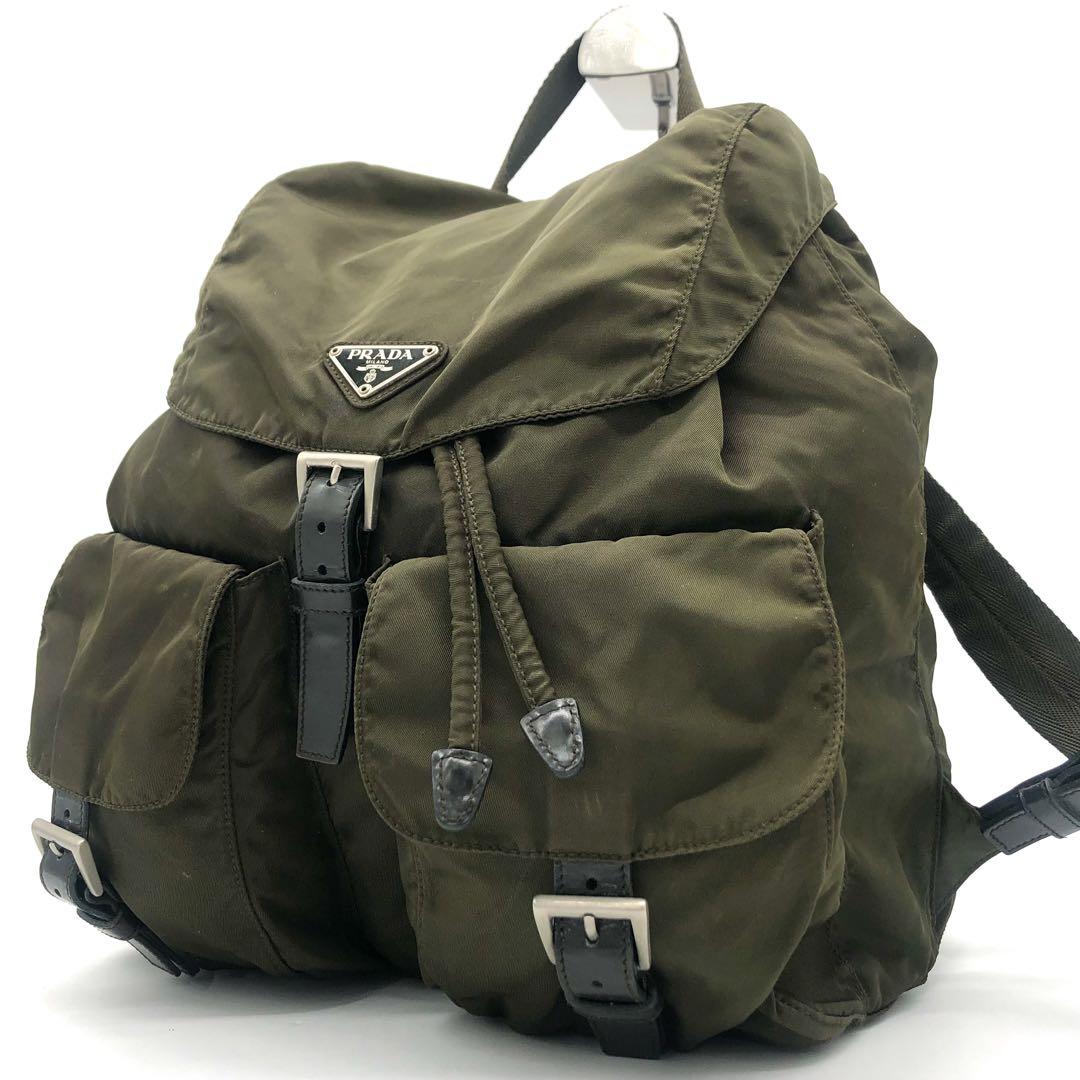 PRADA プラダ　リュックサック　三角プレート　ナイロン　巾着　カーキ PRADA - m56【美品】プラダ 三角ロゴ ナイロン レザー 巾着