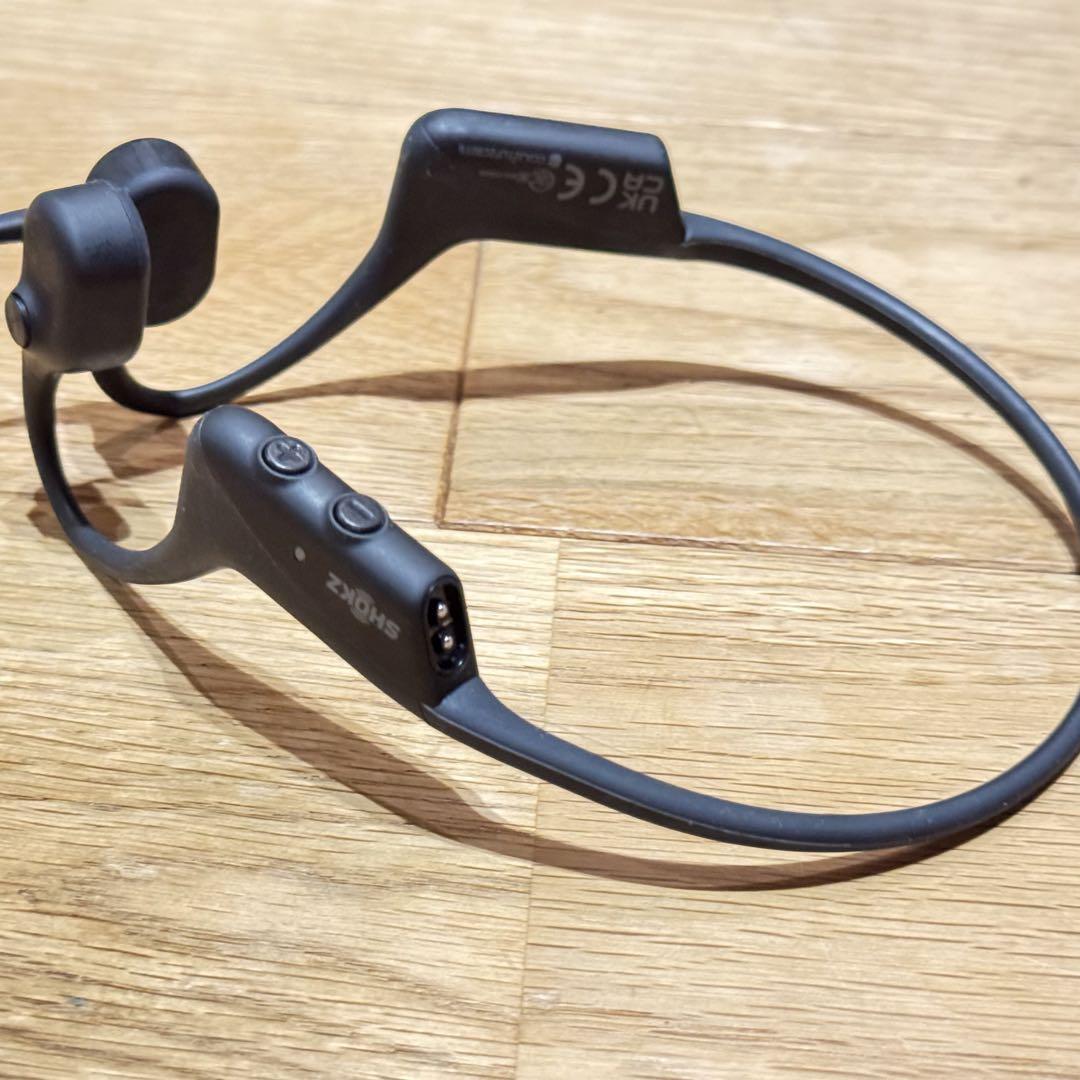 Shokz opencomm 骨伝導イヤホン 収納ケース付き - メルカリ