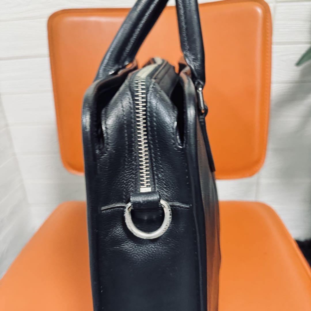 美品 コーチ　ビジネスバッグ　ブリーフケース ロゴ型押し 2WAY レザー A4