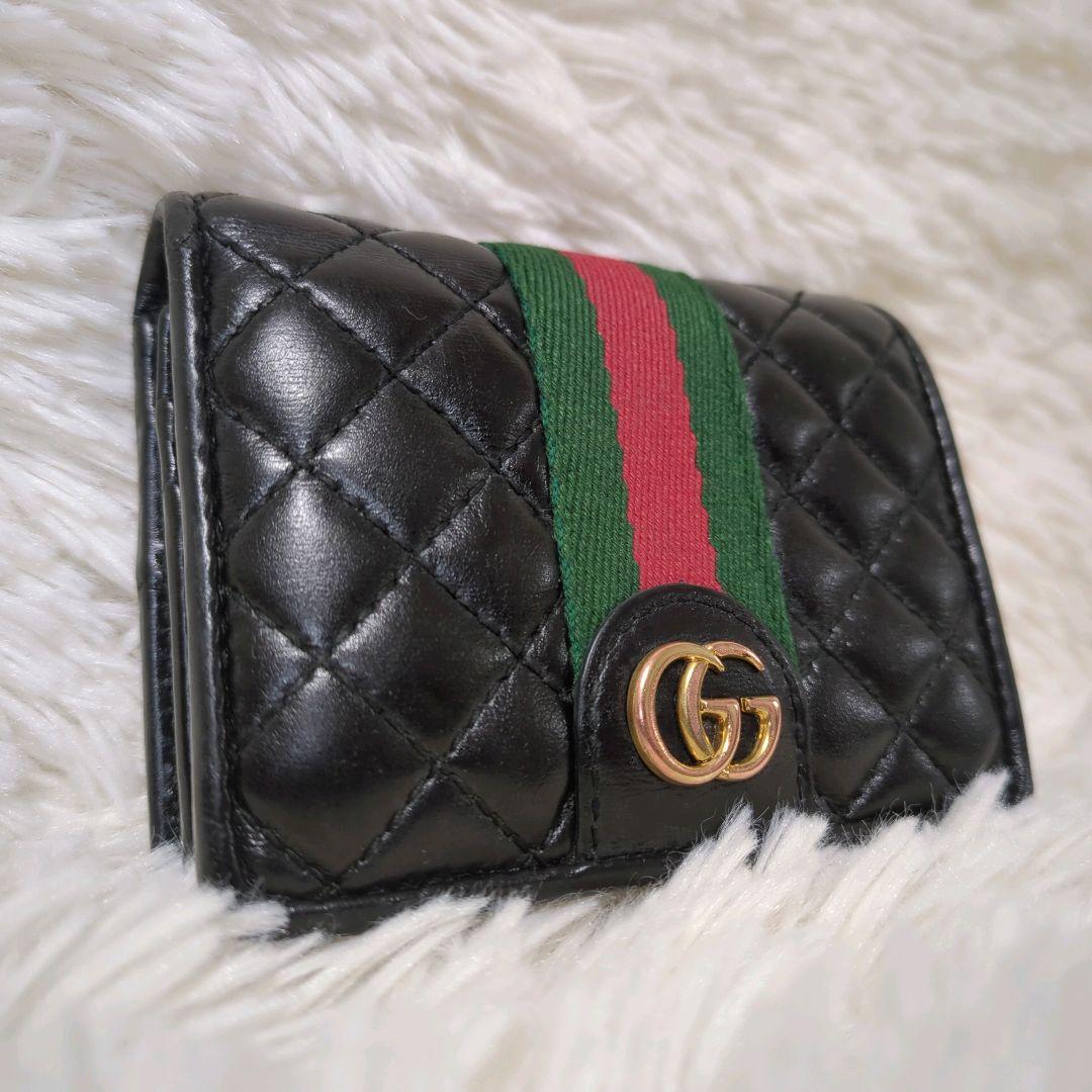 良品☆グッチ 二つ折り財布 GGマーモント シェリーライン キルティング レザー