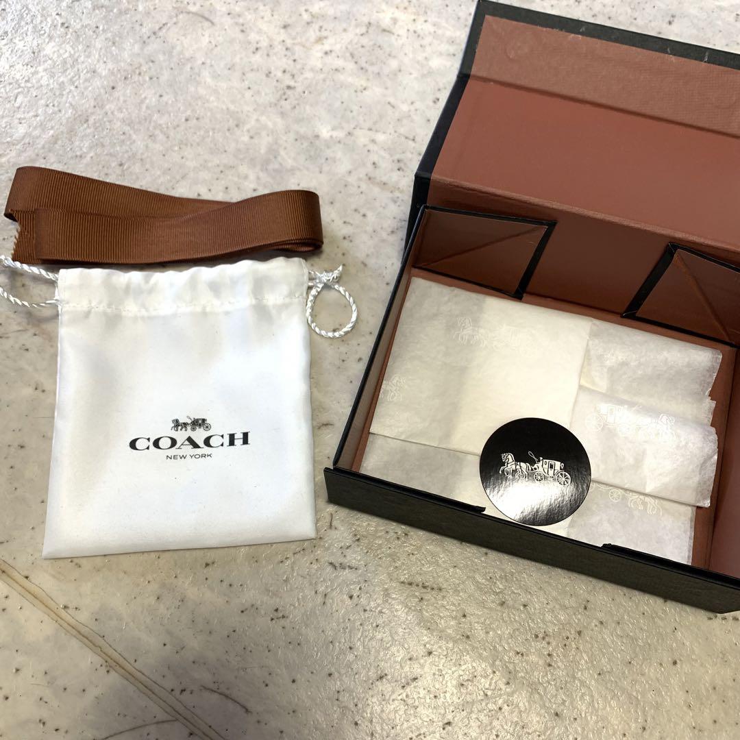 コーチ　スマホリング　レキシー