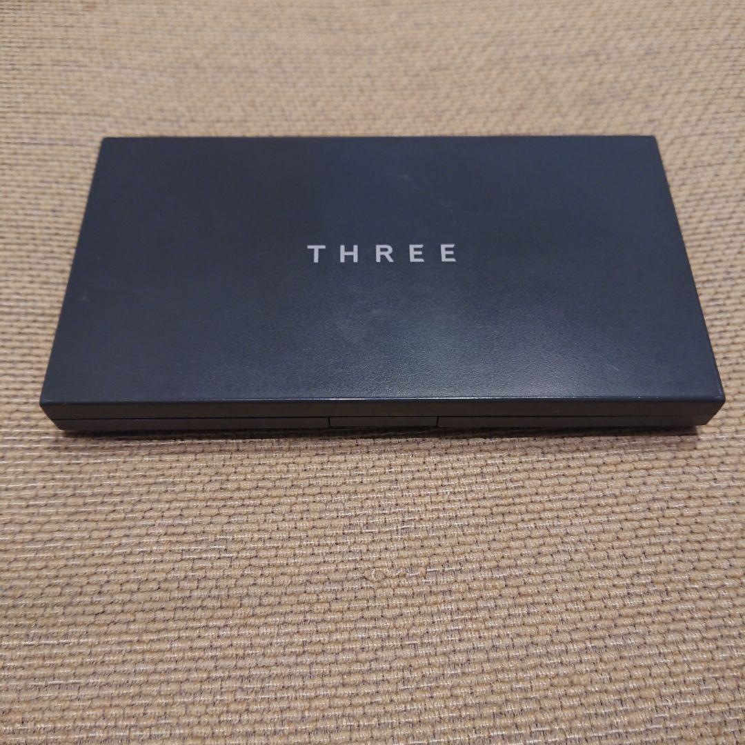 THREE プリスティーンコンプレクションパウダーファンデ 202