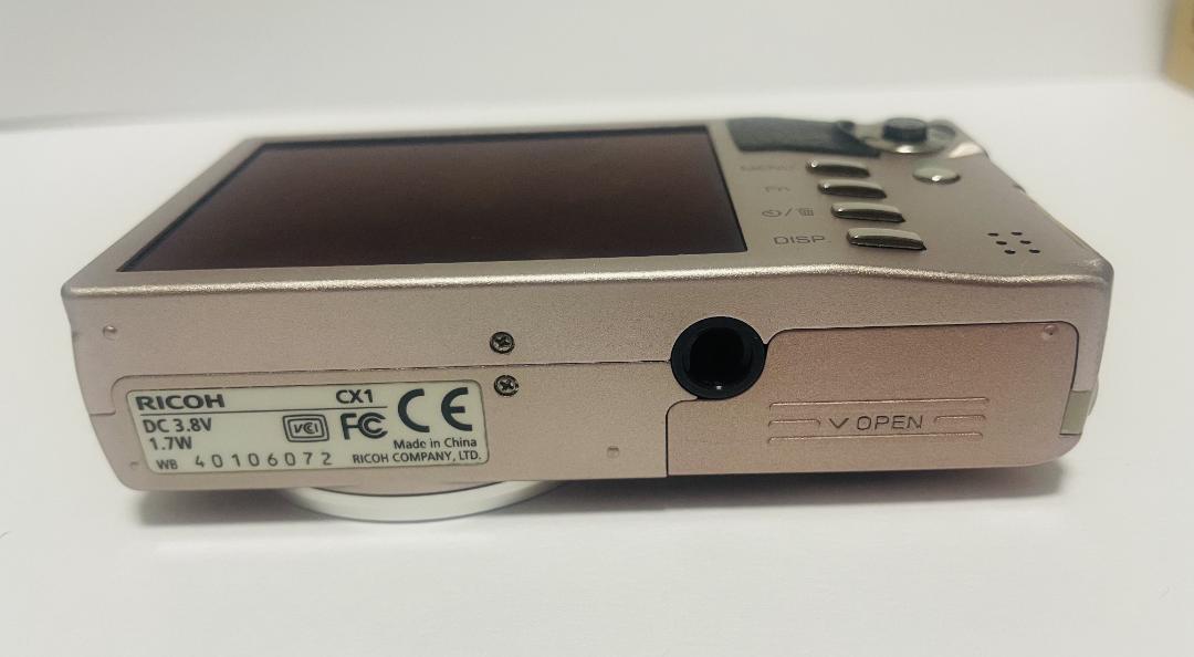 ◇◇超美品！RICOH CX-シャンパンロゼ 新品ネックストラップ付