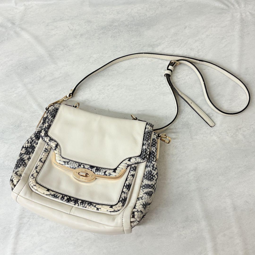 COACH スモール ターンロック スリング パック アイボリー 公式】スモール ターンロック スリング パック・シグネチャー