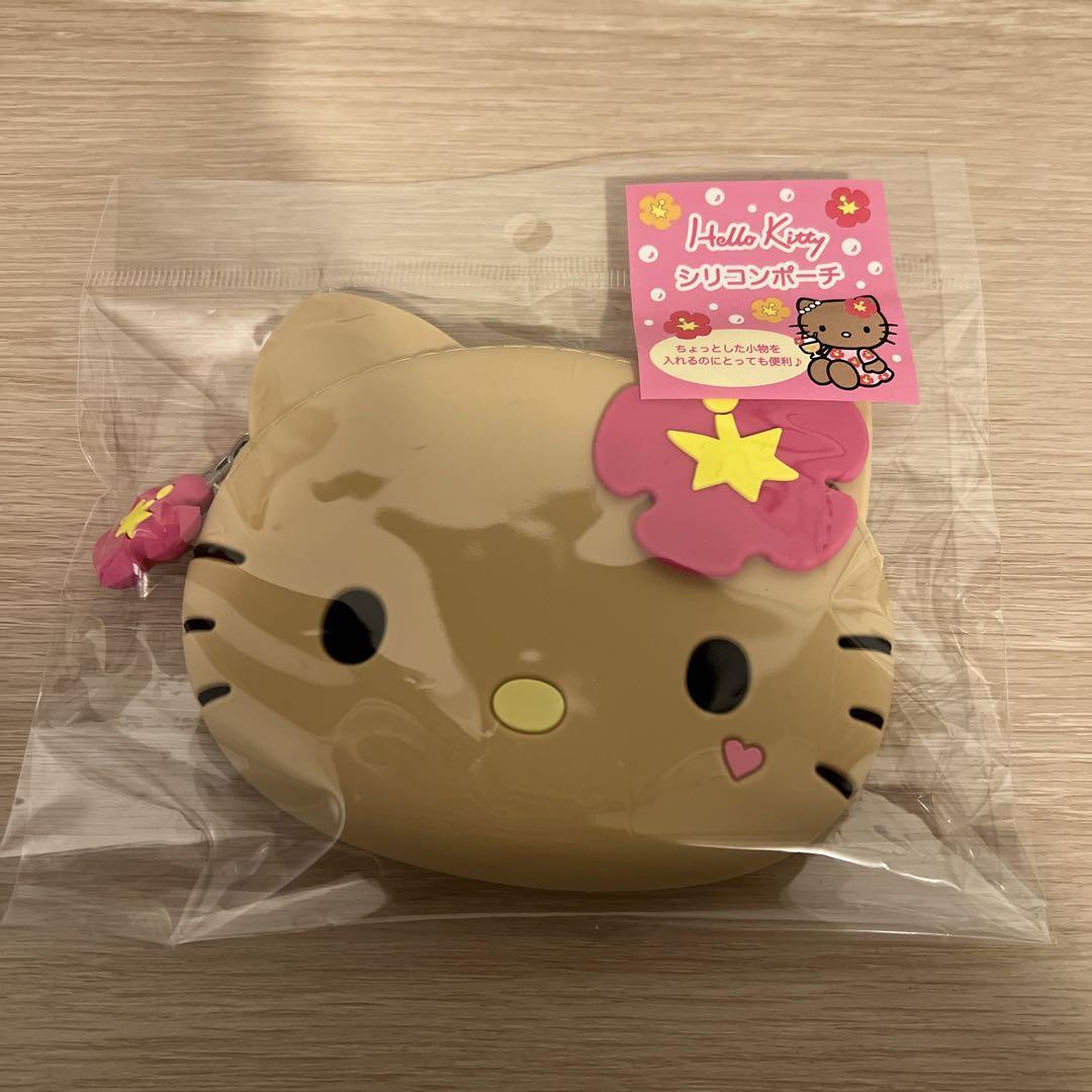 ハローキティ シリコンポーチ 日焼け GOGOギャル - メルカリ