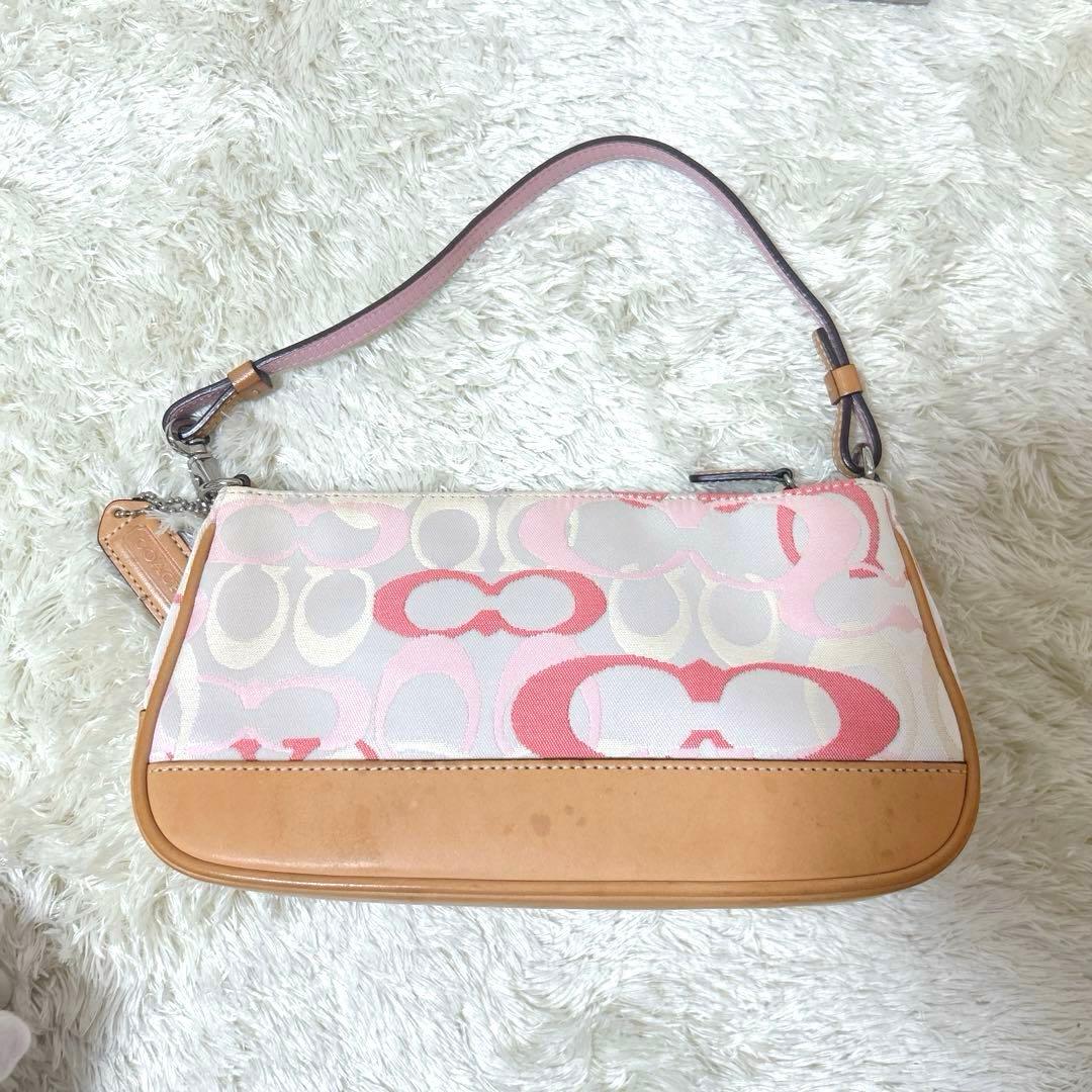 グローバル送料無料。 コーチ ワンショルダーバッグ ピンク ベージュ 7027 ポーチCOACH