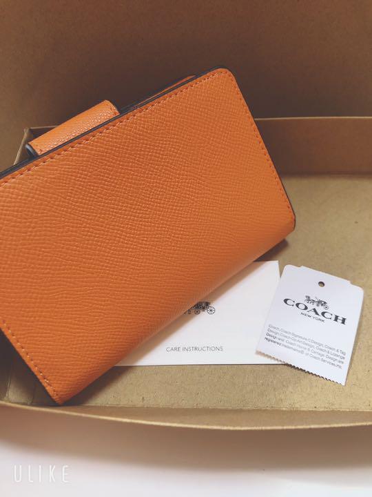 新品/未使用COACHコーチミディアムコーナージップ折り財布 Mango