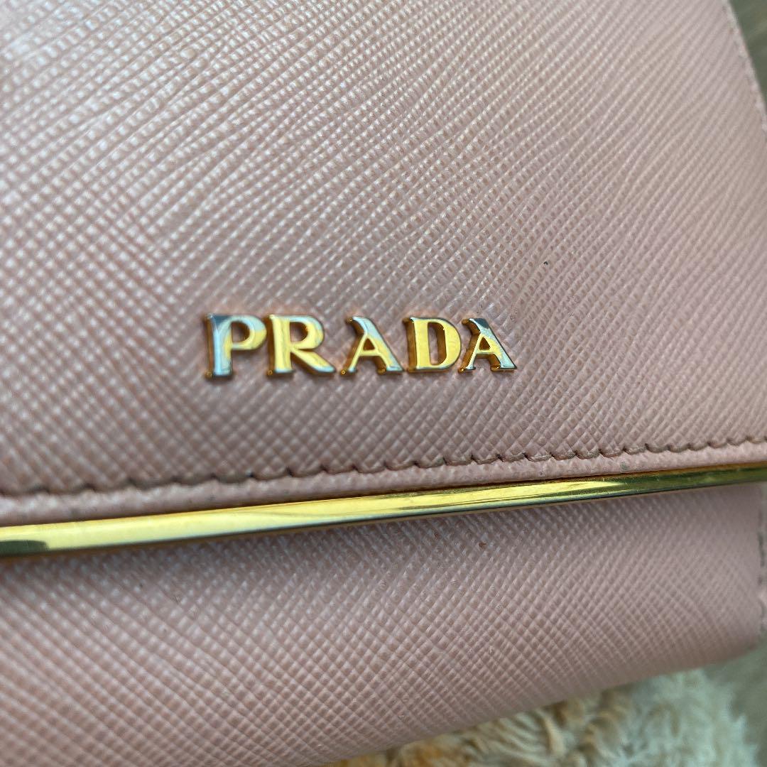 プラダ PRADA Wホック二つ折り財布 ピンク サフィアーノレザー - メルカリ 公式サイト プラダ PRADA Wホック二つ折り財布 ピンク サフィアーノレザー 折り財布