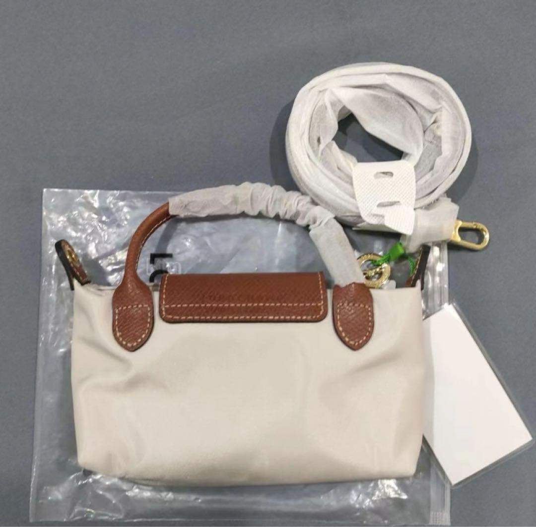 LONGCHAMP ロンシャン ワンショルダー ハンドバッグ ミニポーチ 新品 ロンシャン LONGCHAMP ハンドル付き ミニポーチ - メルカリ