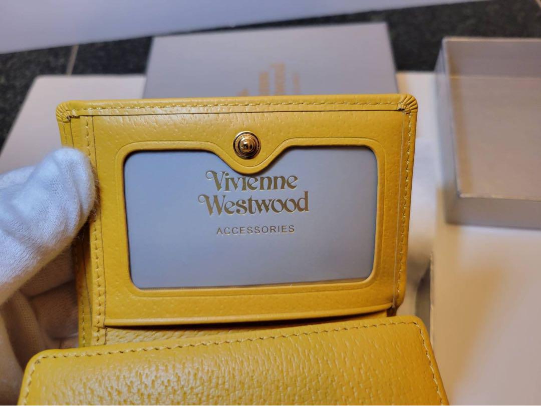新品 Vivienne Westwood 三つ折り財布 Yellow - メルカリ