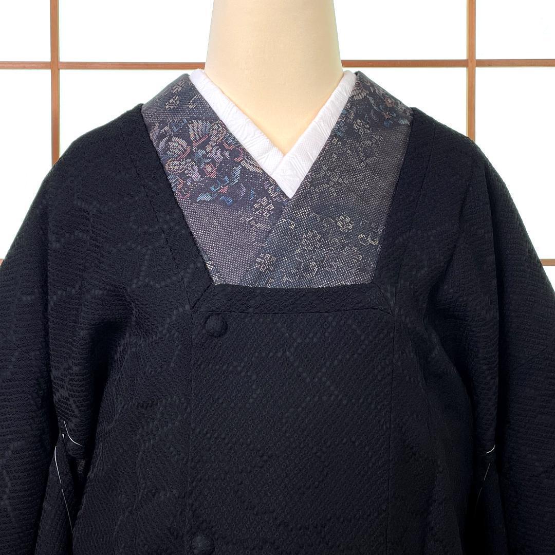 黒 膨れ織