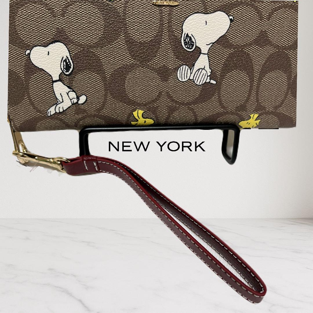本日23時までの特別価格！COACH スヌーピー 長財布 ブラウンCE705 COACH スヌーピー 長財布 ブラウンCE705 - メルカリ