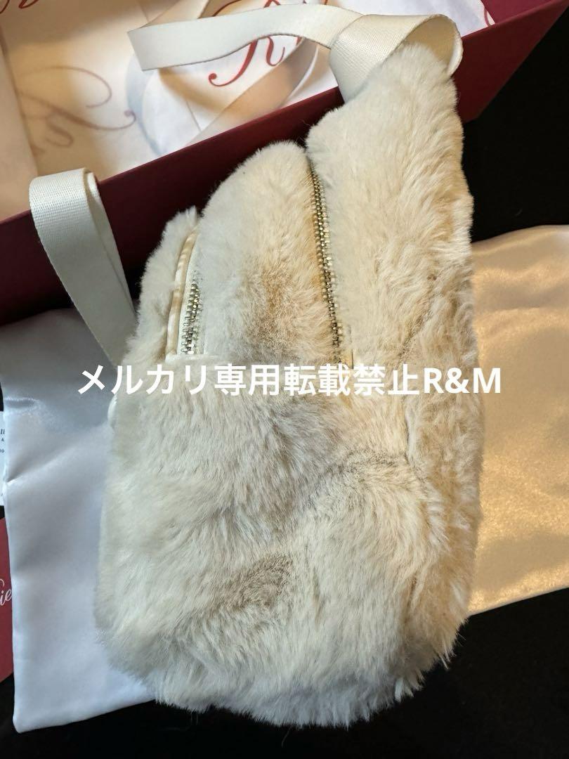 「ウォーキーヴィヴ」 ストラスバックル ファーバックパック ミニ　ベージュ