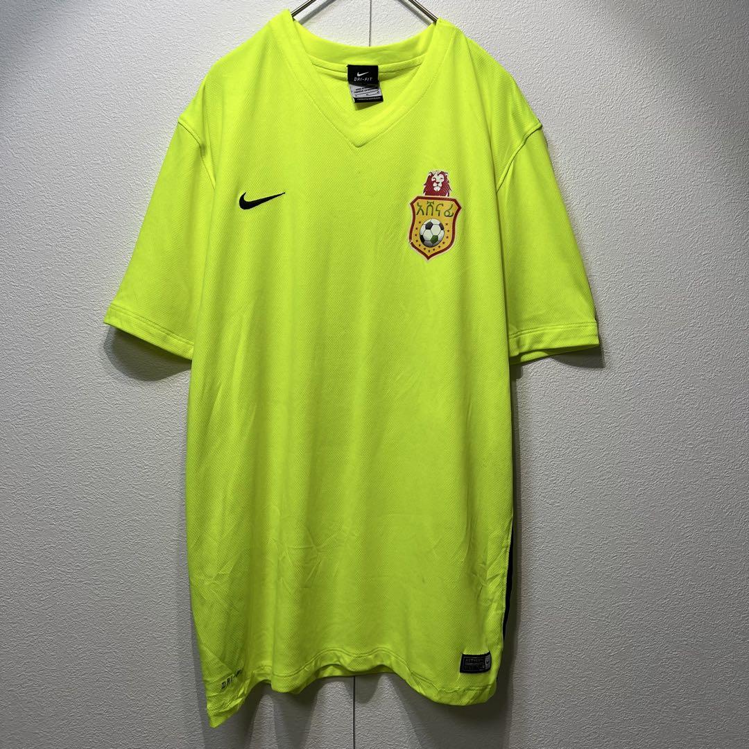 【US規格】希少 NIKE 刺繍ロゴ プリント サッカーシャツ イエロー M