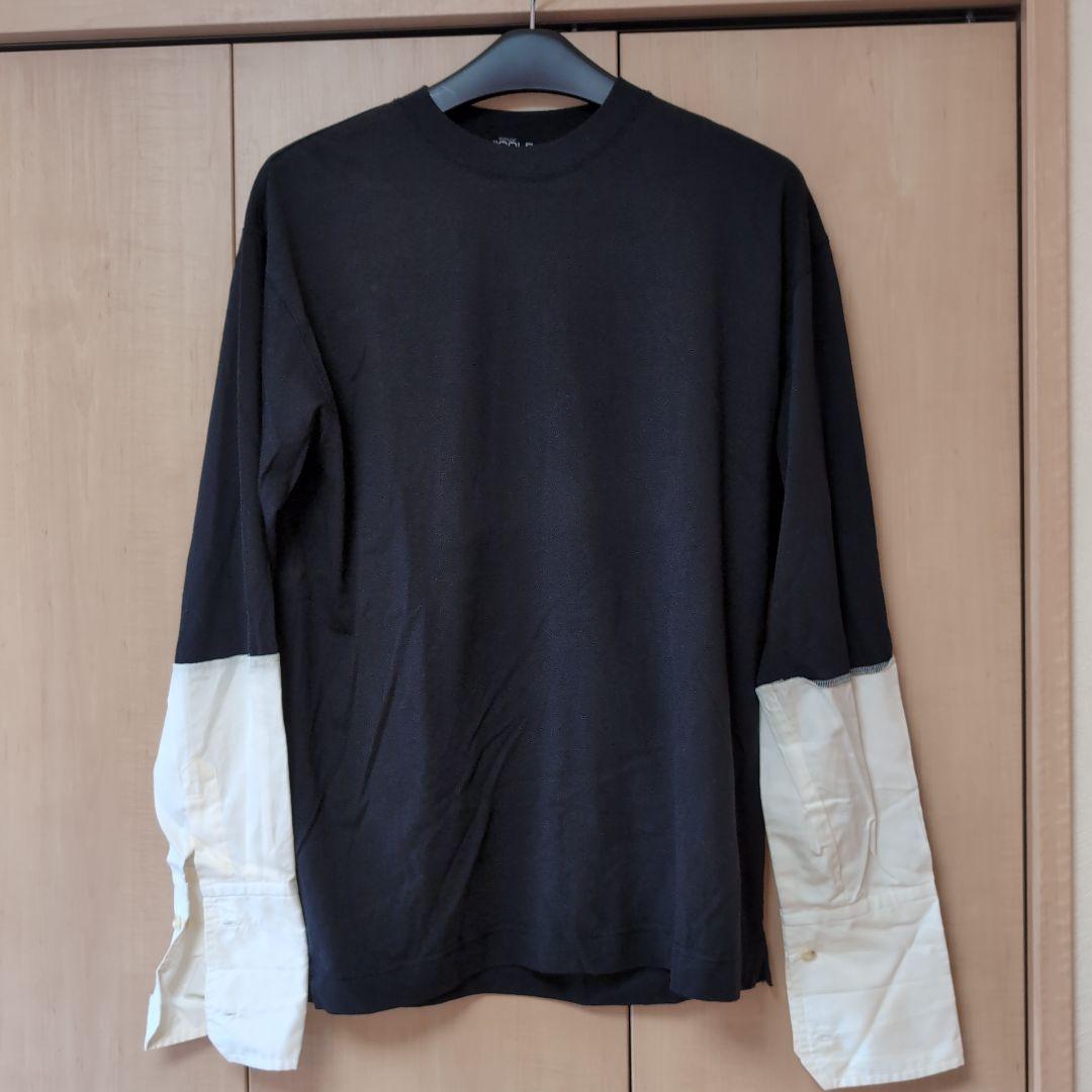 ニコル　黒と白の長袖Tシャツ
