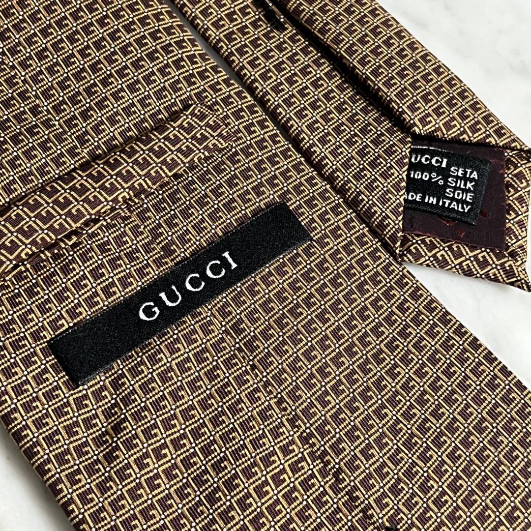 GUCCI ネクタイ ブラウン GGロゴ シマ柄 シグネチャー 総柄