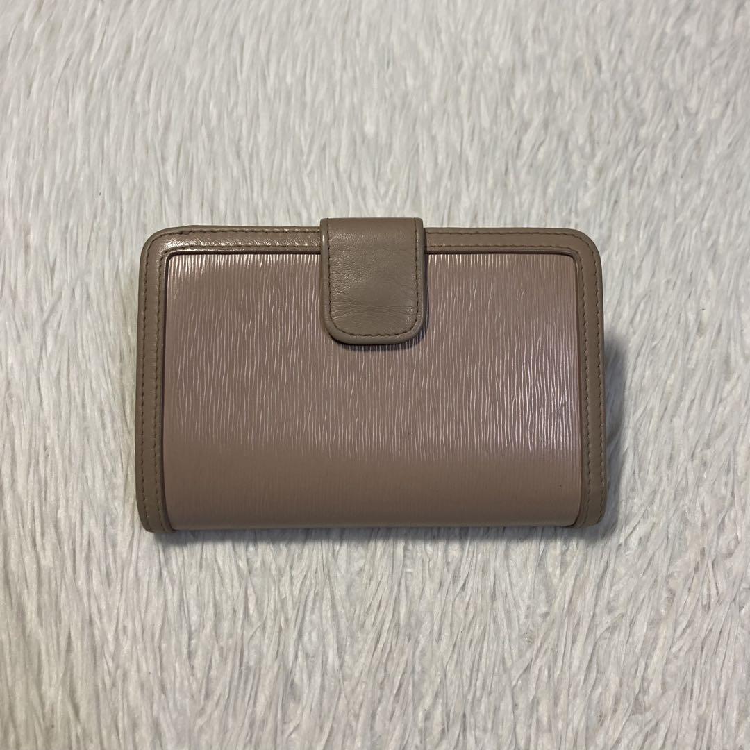 最終値下げ　美品　PRADA プラダ　二つ折り　L字ファスナー　リボン　肌色