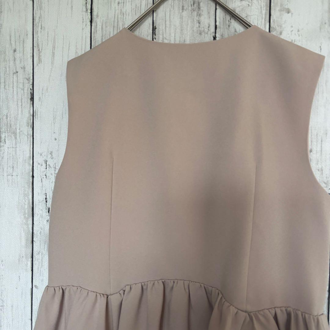 新品 アプワイザーリッシェ ジレ M ピンク ペプラム 2023 パールボタン 新品 アプワイザーリッシェ ジレ M ピンク ペプラム 2023 パールボタン