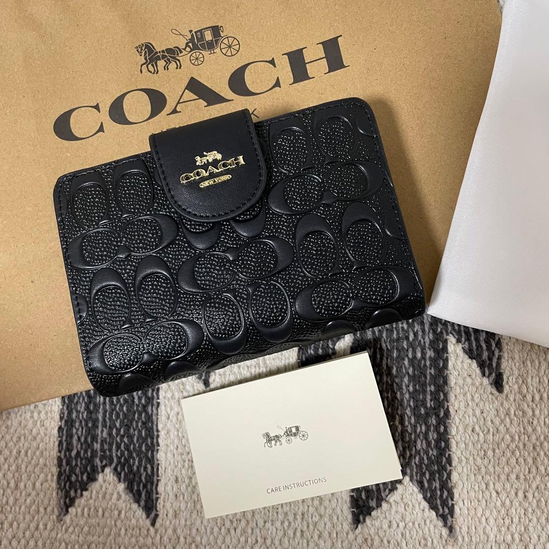 無料サンプルOK 23 新品 未使用 COACH コーチ シグネチャー 2つ折り