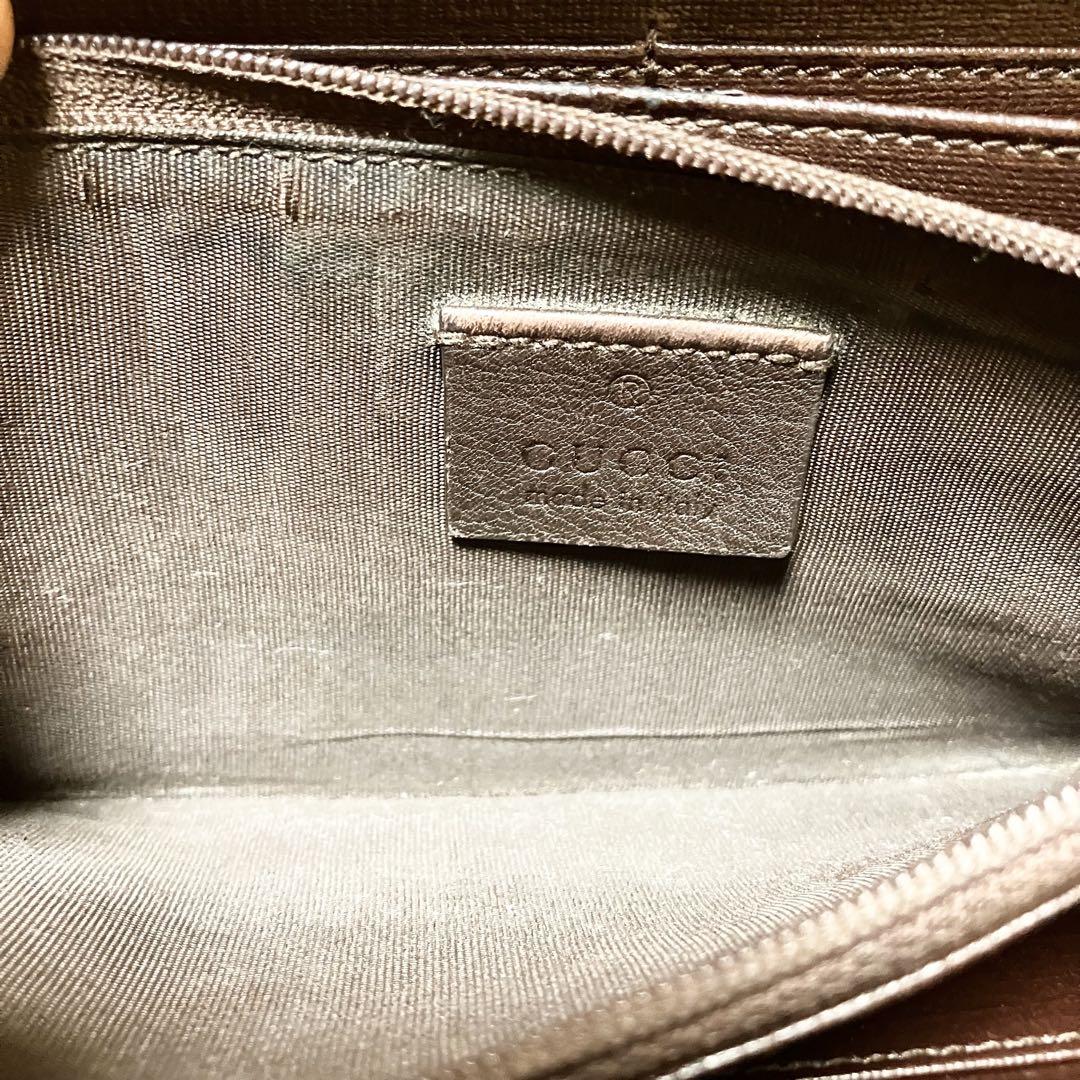 GUCCI ダークブラウン GGマーク フルジップ 長財布 エンボス加工 GUCCI ダークブラウン GGマーク フルジップ 長財布 エンボス加工