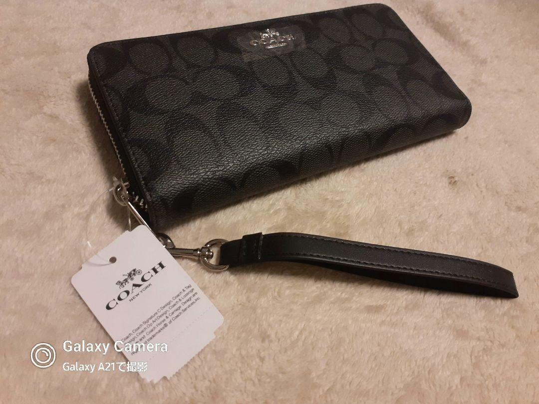 COACH ロング ジップ アラウンド ウォレット シグネチャー キャンバス