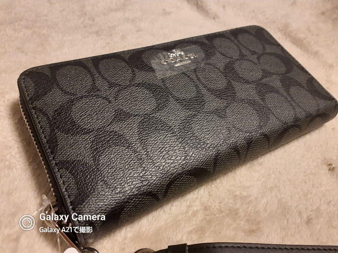 COACH ロング ジップ アラウンド ウォレット シグネチャー キャンバス