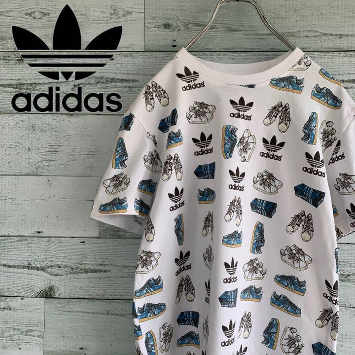 メルカリ Adidas アディダス Tシャツ 総柄 スニーカープリント メルカリ Adidas アディダス Tシャツ 総柄 スニーカープリント
