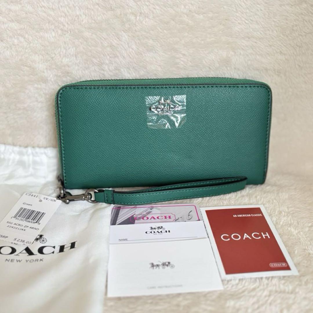 【新品】COACH グリーン ラウンドファスナー 長財布 保存袋付き メンズ