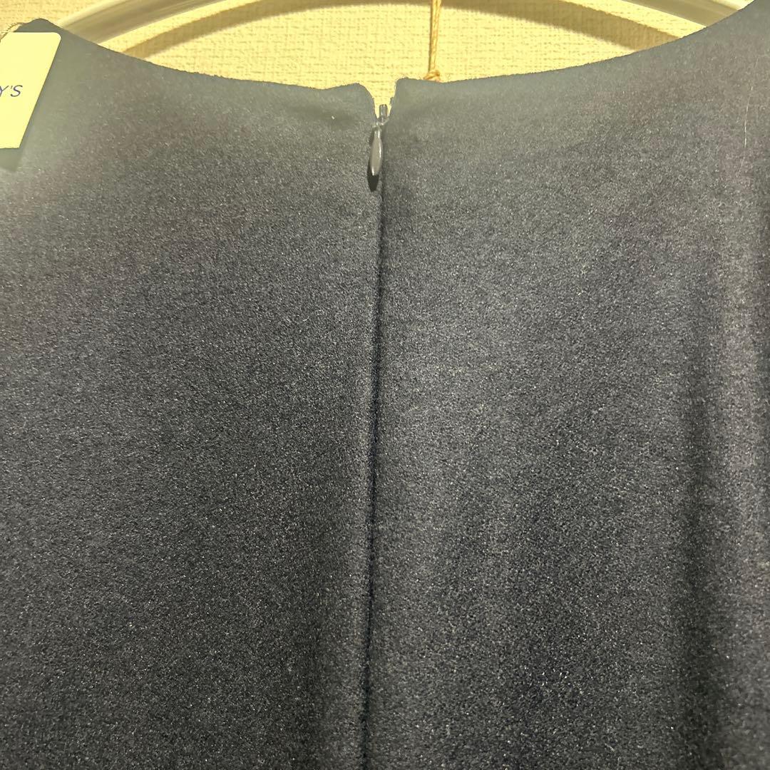 タグ付き新品。ノーリーズ袖フリルロングスリーブ ワンピース 濃紺 タグ付き新品。ノーリーズ袖フリルロングスリーブ ワンピース 濃紺