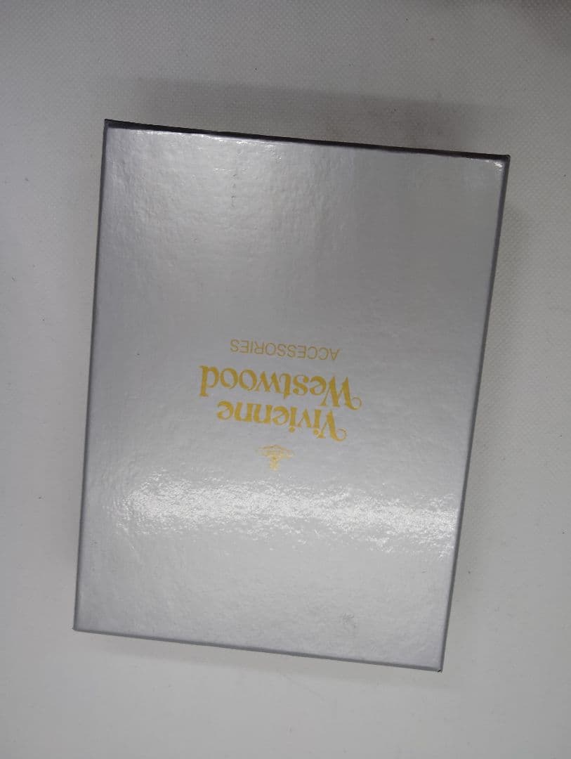 新品未使用ヴィヴィアンウエストウッドがま口バーガンディ 三つ折り財布 金色