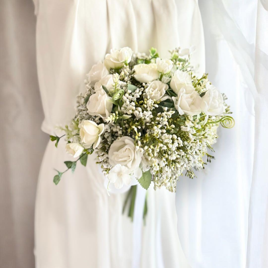 かすみ草×小花クラッチブーケブートニア