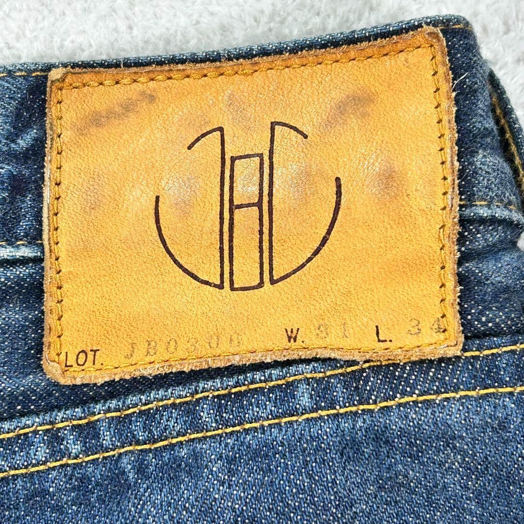 【JAPAN BLUE JEANS】タイトジーンズ　ロゴ入りボタン　JB0306