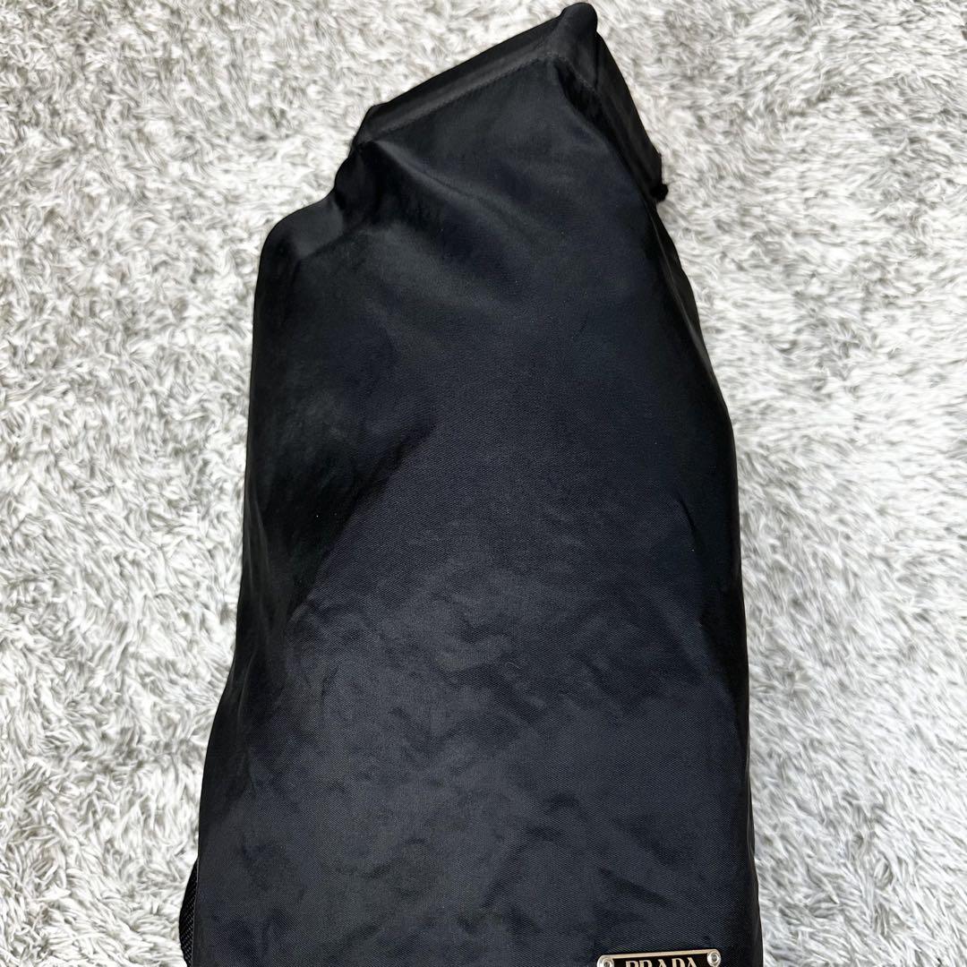 PRADA プラダ ボンサック ドラムバッグ 三角ロゴ BLACK - メルカリ