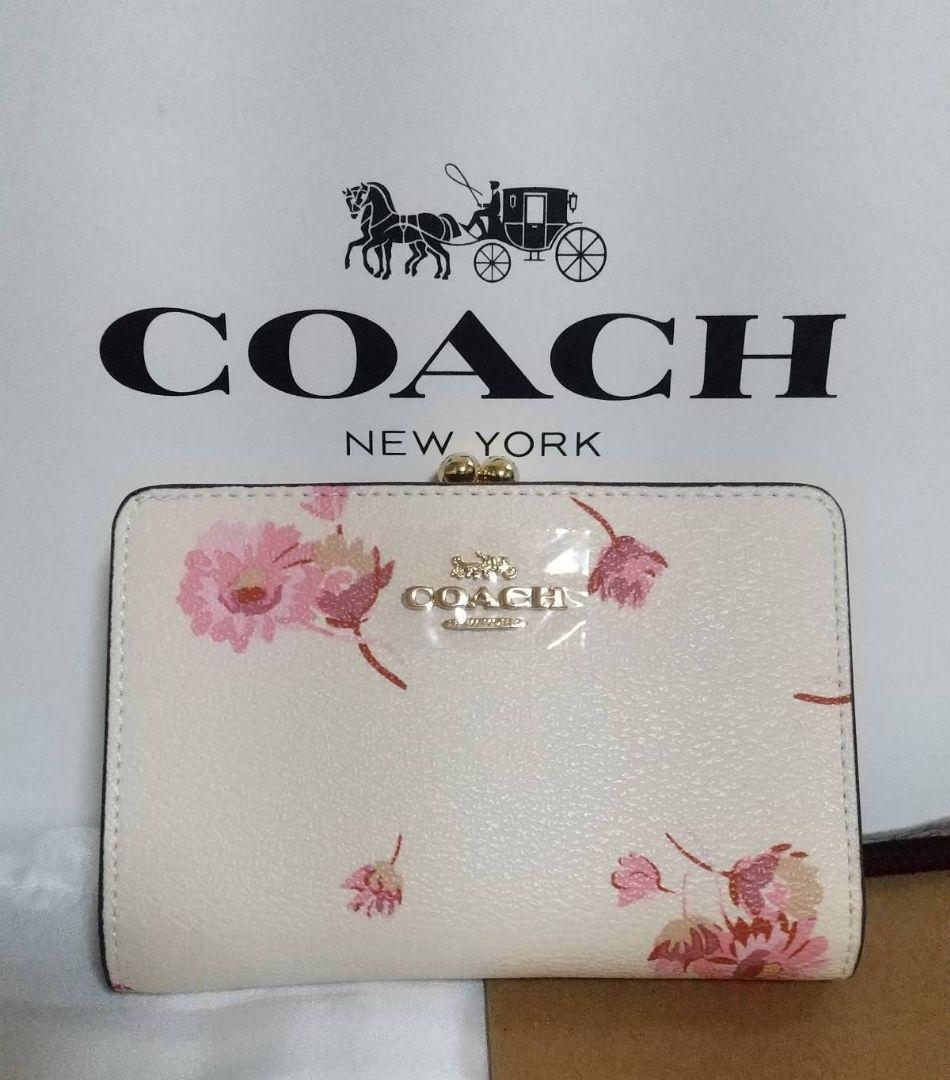 今ならほぼ即納！ COACH 二つ折り財布 がま口 花柄 - メルカリ 小物