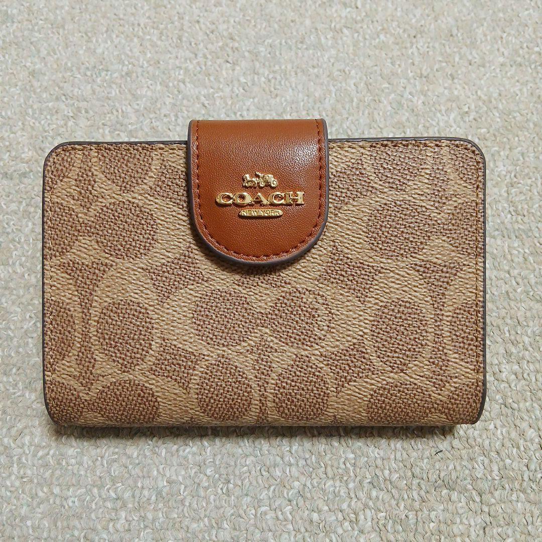 COACH 二つ折り財布 ブラウン COACH コーチ 二つ折り財布 ブラウン - メルカリ