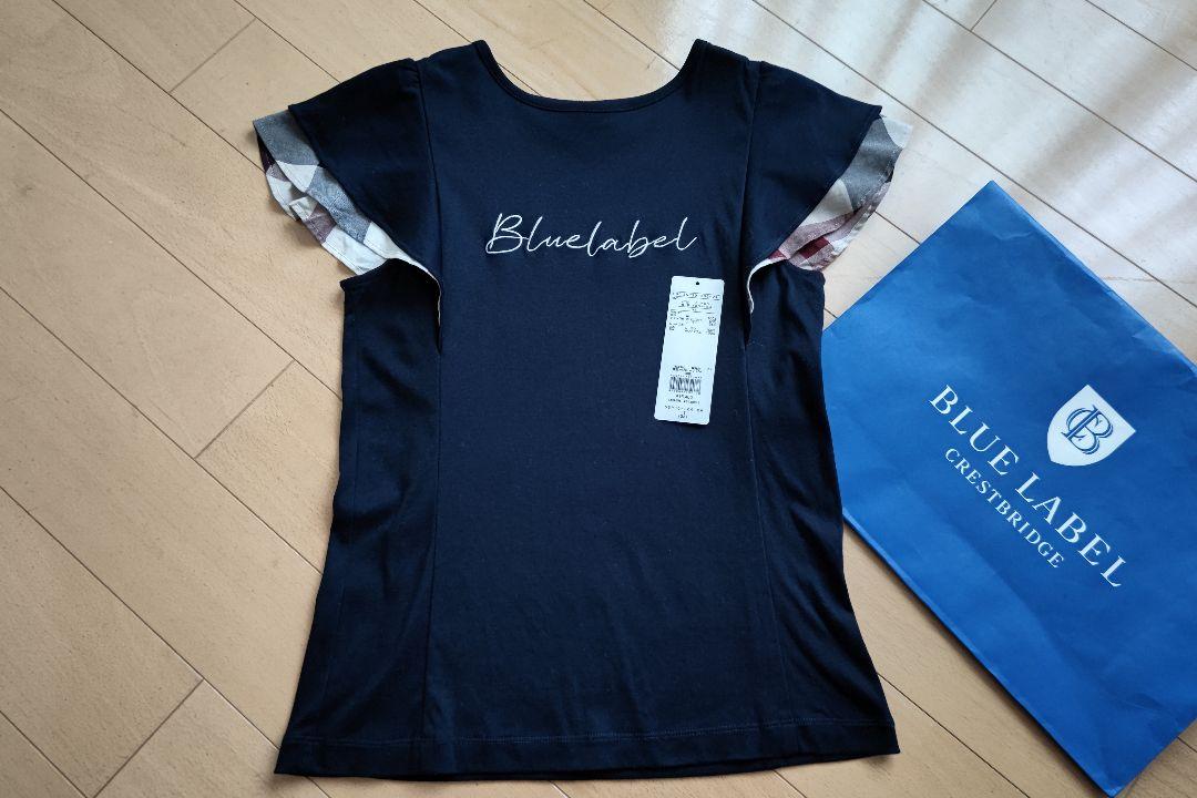 ブルーレーベルクレストブリッジ　ベージュチェックフリルスリーブロゴTシャツ