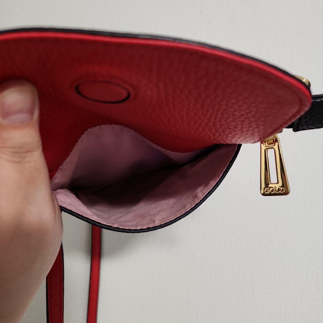 ココセリュックスゴールド 黒のレザーショルダーバッグ ココセリュックスゴールド 黒のレザーショルダーバッグ