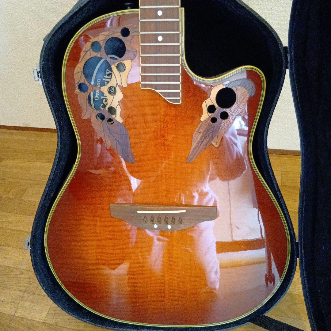 オベ−ション、エレキアコースティックギター オレンジ/ブラウン オベ−ション、エレキアコースティックギター オレンジ/ブラウン